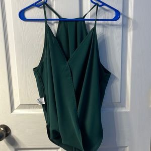 Dark Green crossover tank. Worn once, soft material.